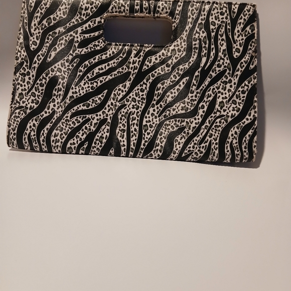 Zebra Print Clutch. Magnetic Snap Closures. - Picture 4 of 8